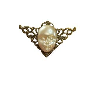 Vintage Artisan Mask Face Brooch White Cabochon Gold Tone Filigree Statement